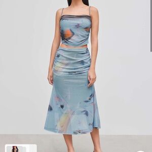 NWT Blue abstract mesh top and skirt set